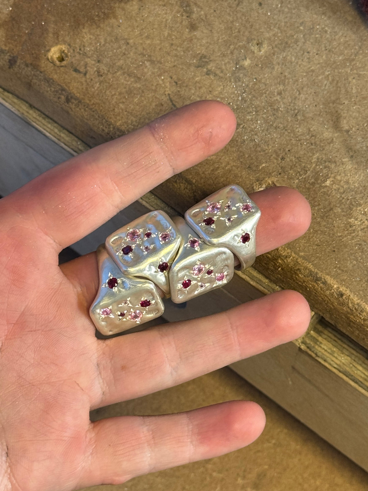 Pink Tablet ring in sterling silver by Meg Henry featuring seven pink gemstones in a bold sculptural statement design.