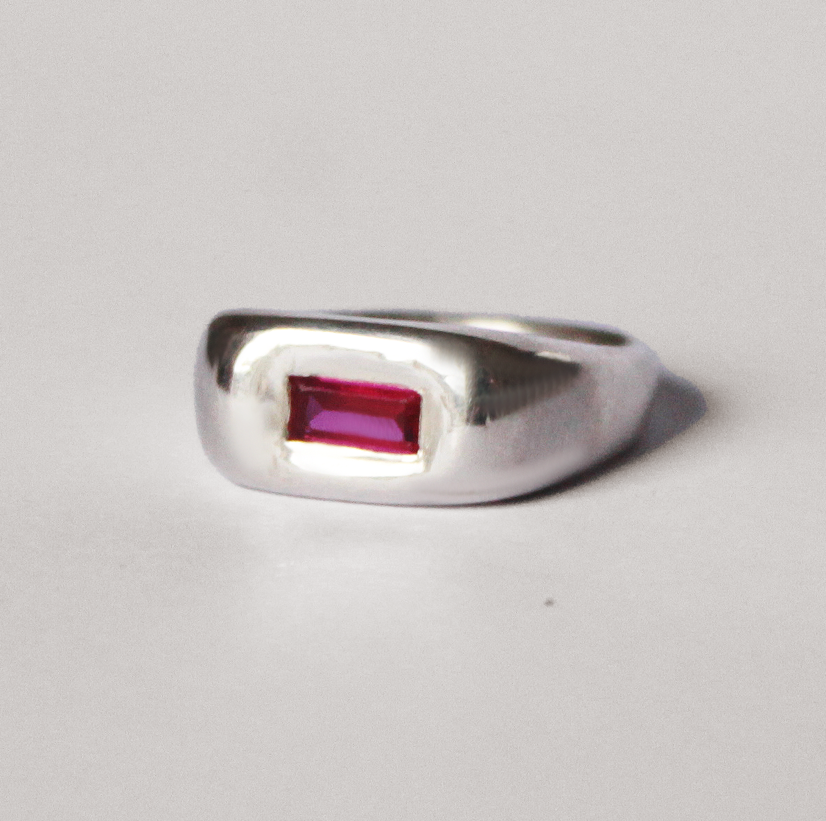 Handmade silver signet ring with ruby baguette stone