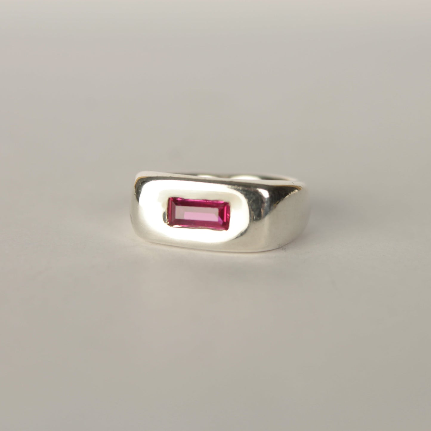Handmade silver signet ring with ruby baguette stone