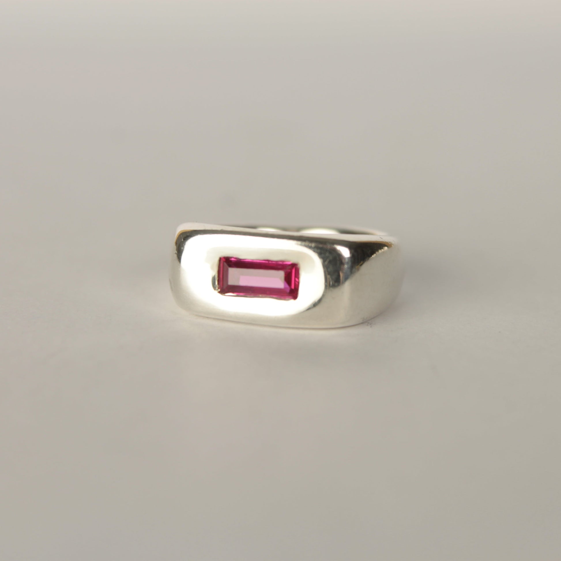 Handmade silver signet ring with ruby baguette stone