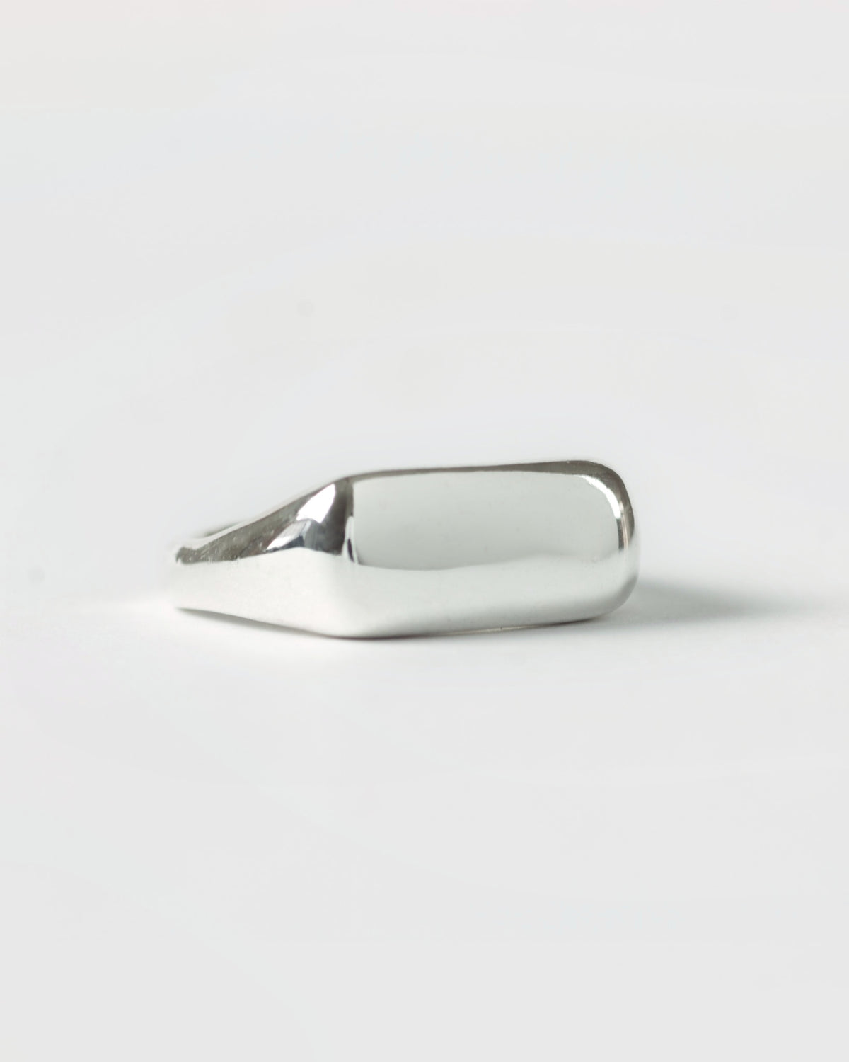 Pillow Stacker ring in sterling silver by Meg Henry featuring a chunky sculptural signet-inspired design with a polished finish.