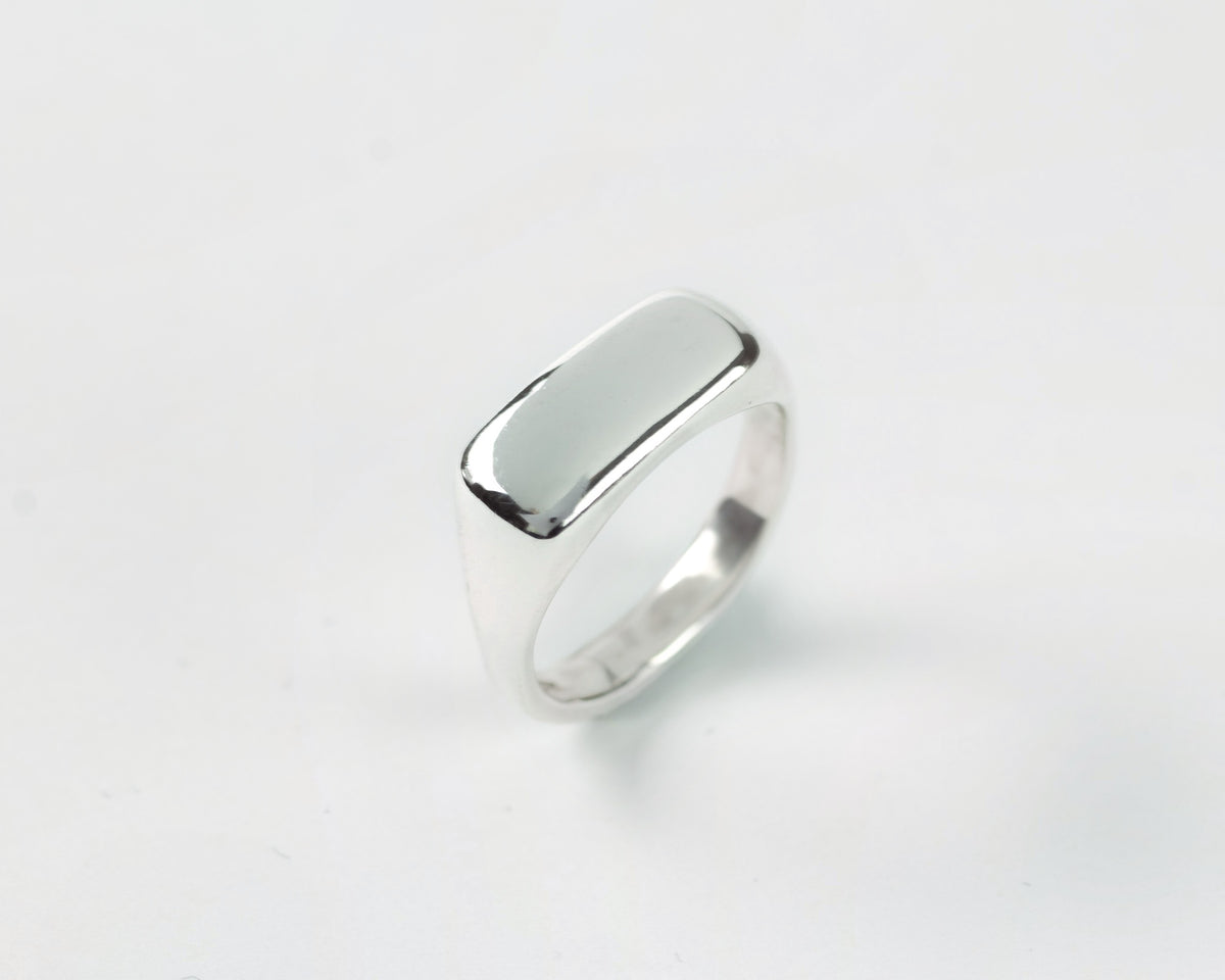 Top View Pillow Stacker ring in sterling silver by Meg Henry featuring a chunky sculptural signet-inspired design with a polished finish.