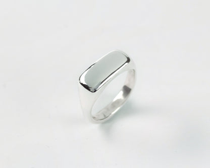 Top View Pillow Stacker ring in sterling silver by Meg Henry featuring a chunky sculptural signet-inspired design with a polished finish.